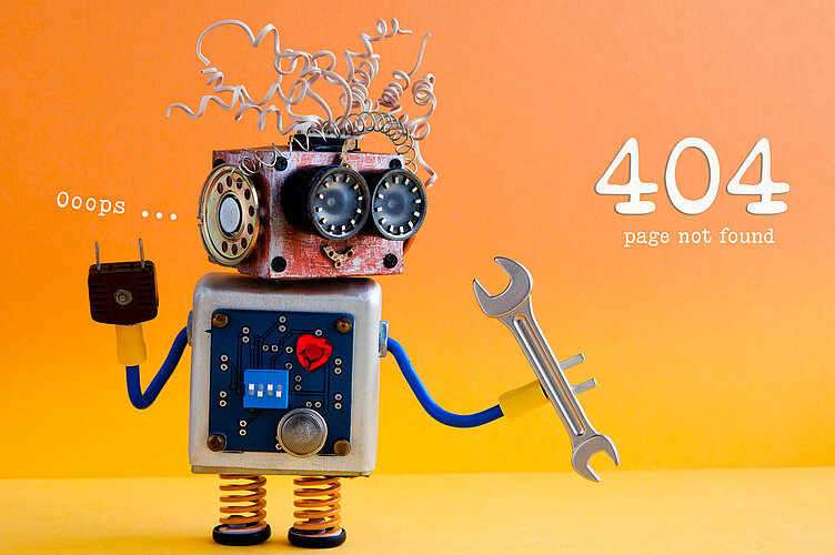 Error 404 page not found - Friendly crazy robot handyman with hand wrench on yellow orange background